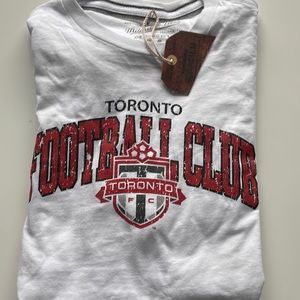 Women’s Size Medium Toronto FC tshirt. Licensed Mitchell & Ness wear.